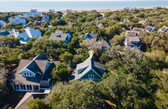 Reel Life tucked into a pretty, wooded bend in prestigious Cape Fear Station!