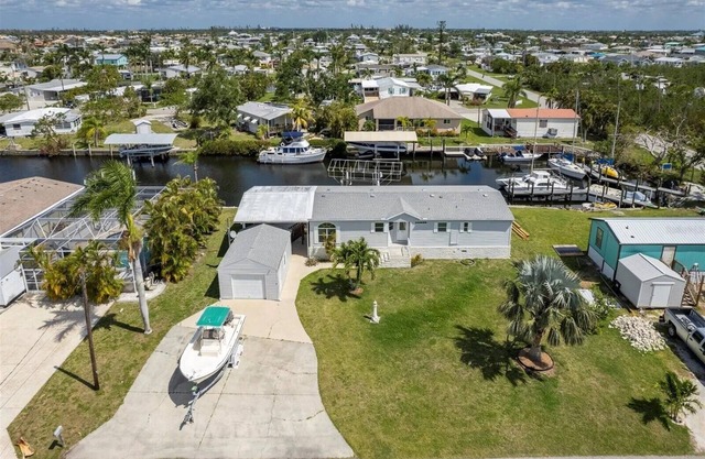 Relax at 710 El Dorado Dr, canal waterfront property with private dock