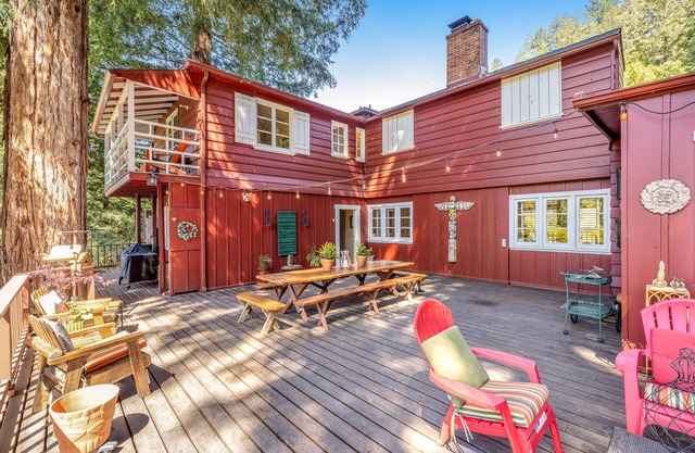 Riverfront, dog-friendly home with private hot tub, fireplaces & amazing decks