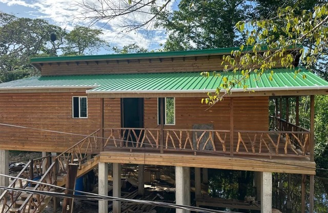 Sade's Enchanted cabin Luxurious Jungle Cabin near the River with AC and WIFI