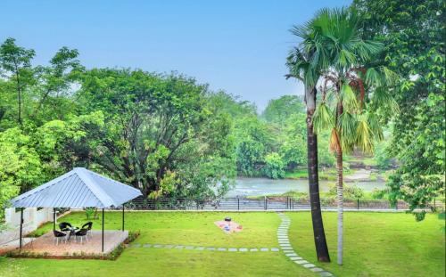 SaffronStays Nilaya by the river