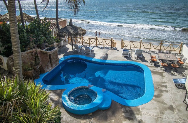 Sandcastle Beachfront Villa with Pool