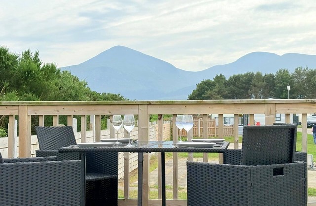Scenic mountain views from “Serenity”, a luxury 6-bed caravan in Newcastle, NI