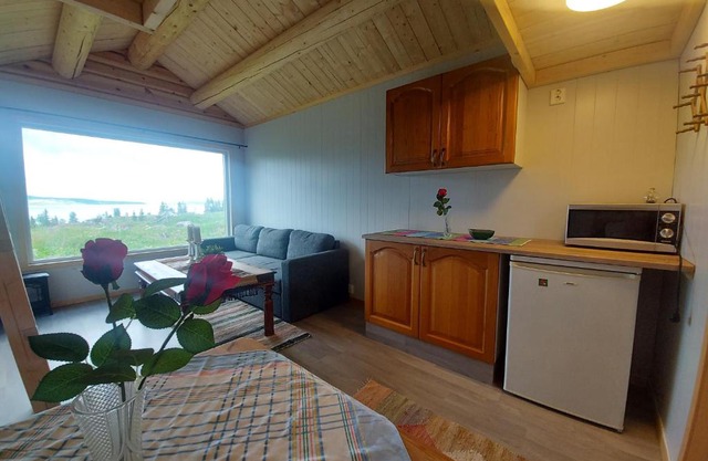 small camping cabbin with shared bathroom and kitchen near by