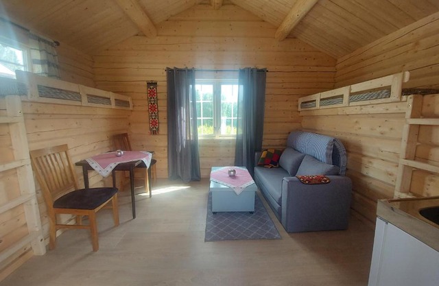 small camping cabbin with bathroom near by