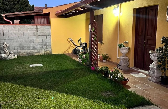 Small villa with garden on three sides