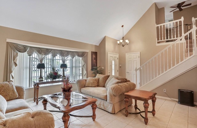 Snowbird-friendly elegant home with waterfront location, pool, grill, fireplace