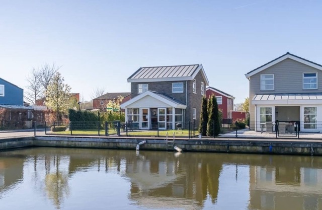 Spacious, modern island house located on a corner with fully enclosed garden, ideal for children.