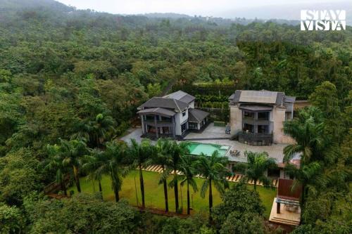 StayVista at Isolaire with Bonfire, Infinity Pool