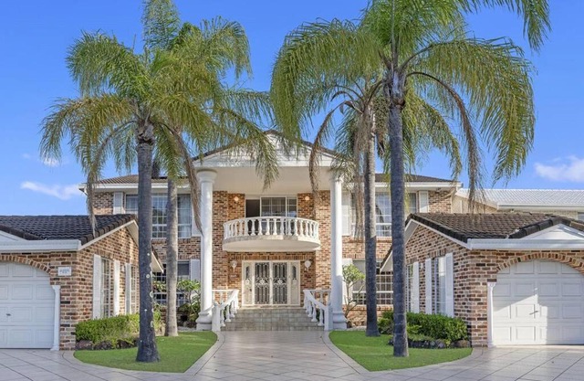 Stunning 4BR Holiday Home with Water Views & Pool