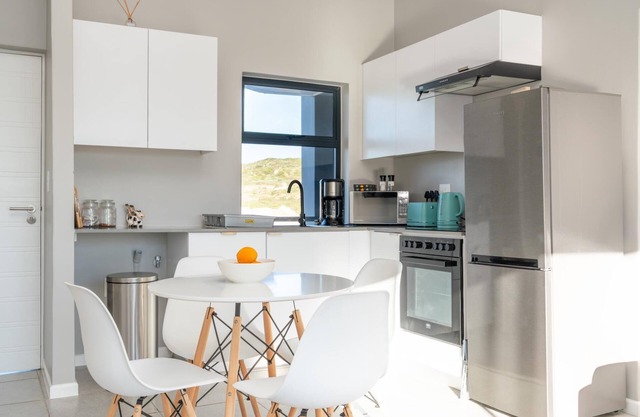 Stylish Urban Stay | Balcony | Braai Area