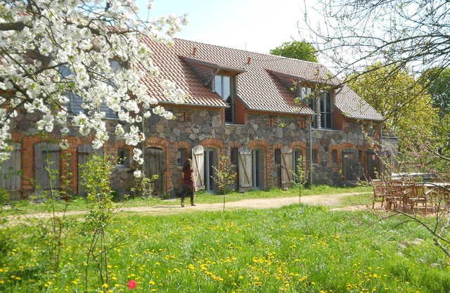 Stylishly furnished fieldstone barn with dining room and terrace by the village pond