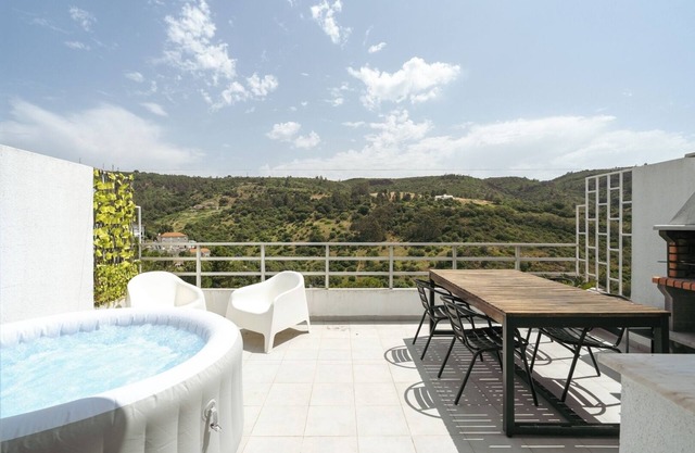 Sunny Flat w/Jacuzzi and Balconies by Host Wise