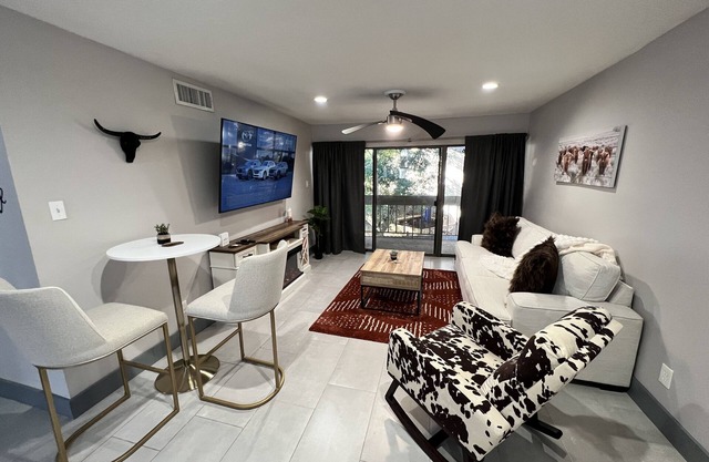 Texas Lake Life is Condo on Lake Conroe with a Texas style! Steps away from lake