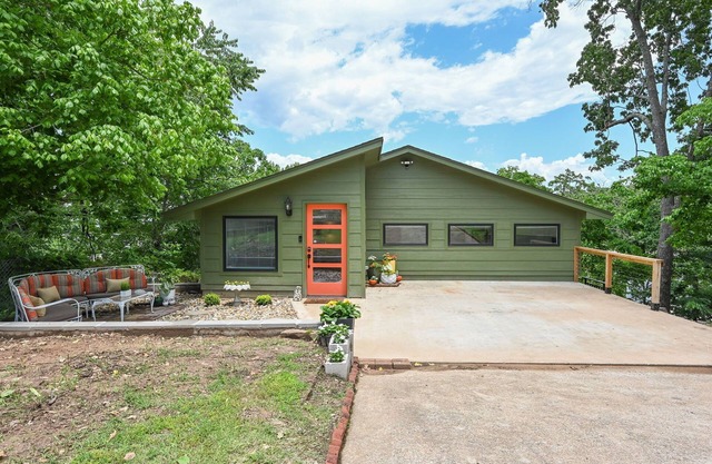 That 70's Lake Front Home w Dock 2-bedroom house, Hot Tub & Fire Pits in Eucha!