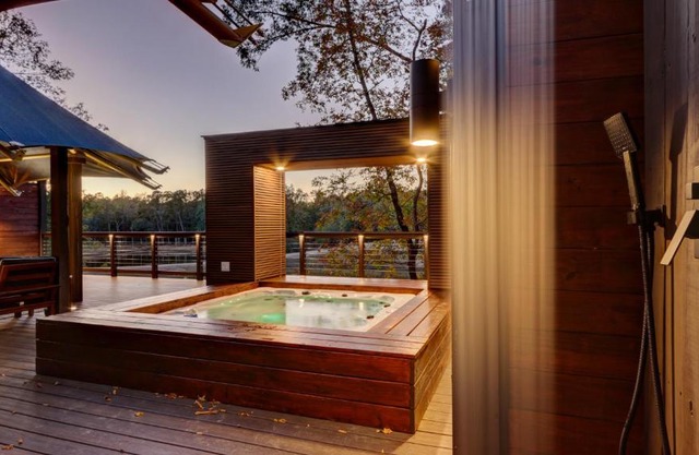 The Covery the Wren House a luxury African tent retreat on stocked bass pond