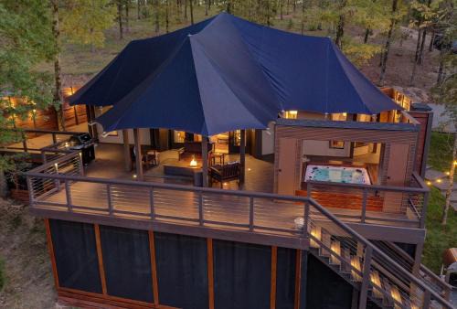 The Covey Bluebird House a Luxury African Tent Retreat on stocked bass pond