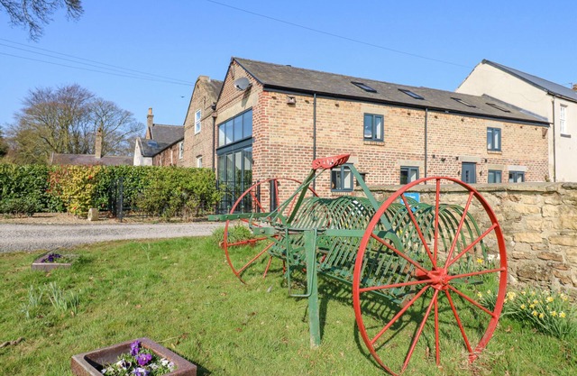 THE HAY BARN, pet friendly, with open fire in Murton, County Durham