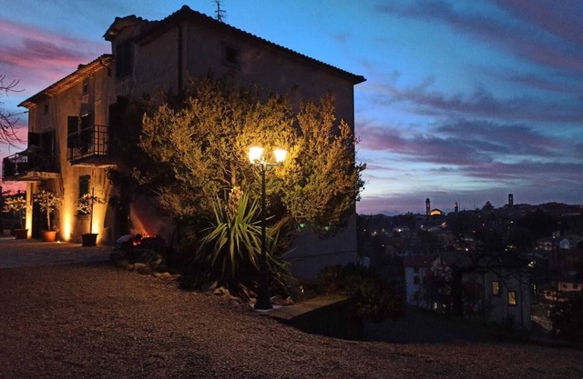 The terrace overlooking the village, a restored Tuscan farmhouse.