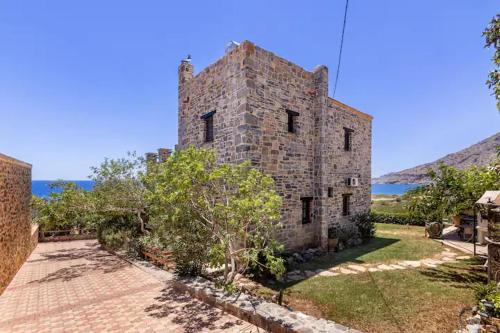Traditional stone house by the sea.