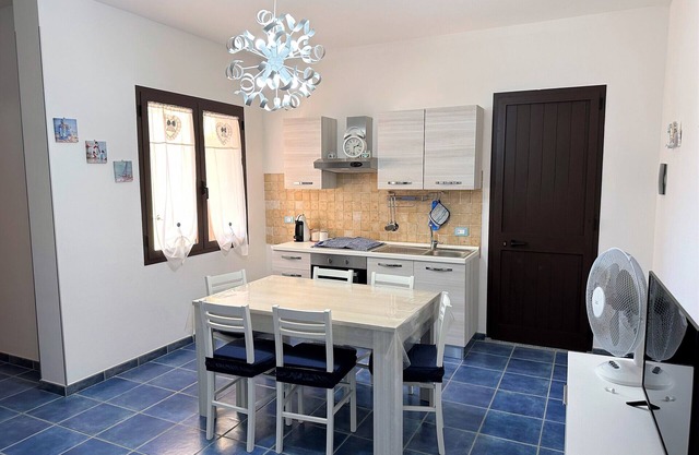 Two-room apartment sleeps 4 ground floor, steps from the sea, with parking space