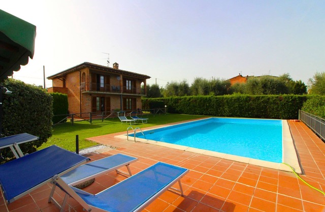 Typical Valdichiana farmhouse in red bricks, near the border between Tuscany and Umbria and a few km