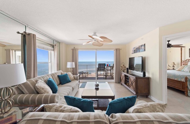 Updated direct oceanfront corner with private balcony, beachfront pool and garage