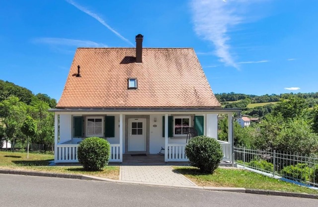 Vacation home with fantastic veranda, garden, fireplace, infrared cabin