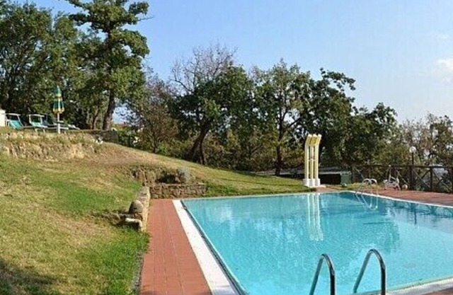 Villa Mariolina Grande: A characteristic and welcoming two-story age-old farm house located in an isolated position, on the slopes of a hill which is covered with olive groves, with Free WI-FI.