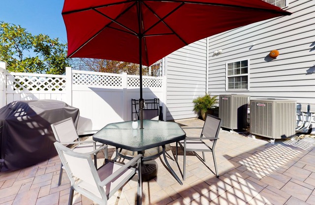 Village of Five Points townhome with pool, tennis, gym, private patio, & grill