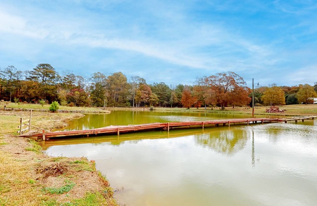 Water-view home with private pool, large deck, firepit, fishing, fireplace, W/D