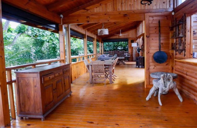 Waterfront wooden chalet overlooking the turquoise lagoon