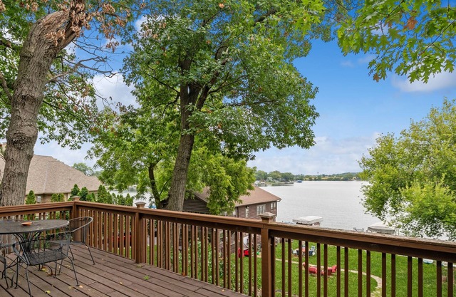 wonderful log home Chain o Lakes waterfront home with pier Monthly rental