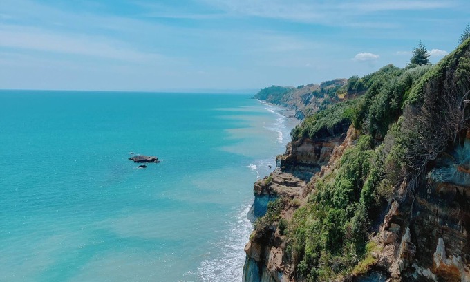 Waiiti House | 180° sea views, superior coastal cottage