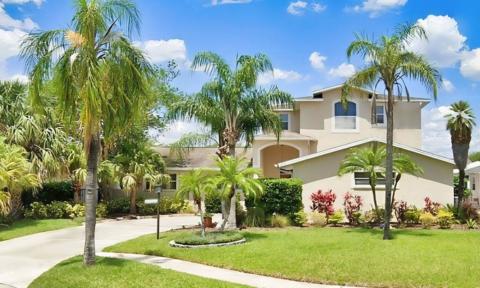 Bay Crest Park House | 2,657-sq-ft upscale canal home with pool, dock & stunning main suite - dog-friendly