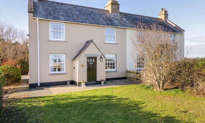 Penmon Cottage | 2 OLD COASTGUARD HOUSE, pet friendly, with open fire in Beaumaris