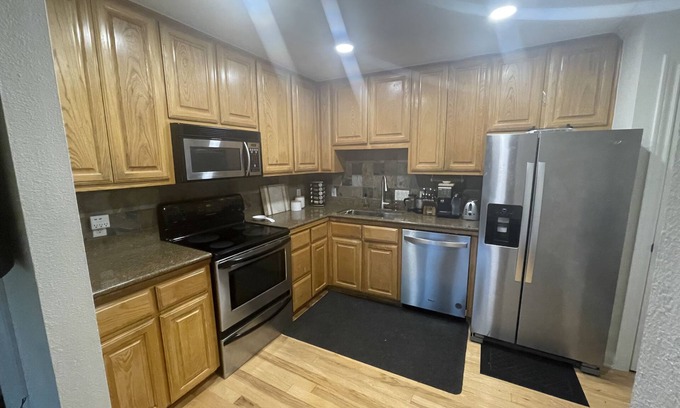North Shoal Creek Condo | 2000 sq ft two story 2 bedroom 1 bath condo w/ fenced patio