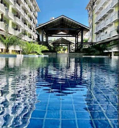 Mactan Export Processing Zone Apartment | 212B Amani Grand Resort Residences near Mactan Airport with pool, gym, wifi, netflix