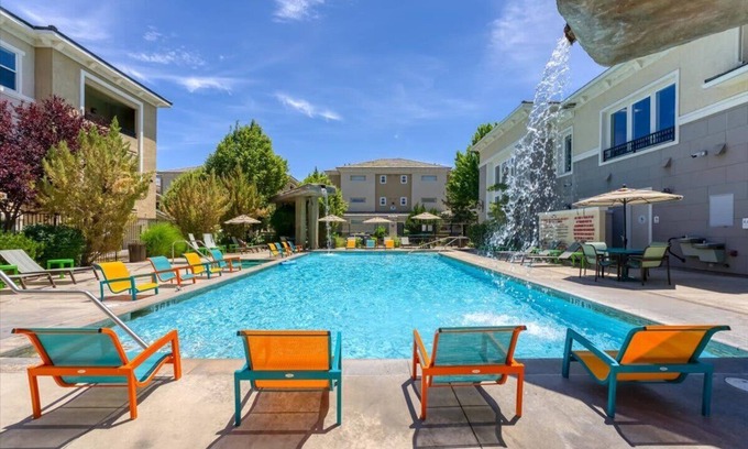 Reno/Tahoe Airport Apartment | 2BR Getaway Pool, Gym, Basketball Court & Theater Access