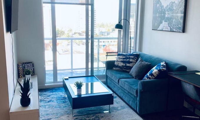 Central Lonsdale Apartment | 360º Rooftop Patio Views. Your-Home-Away-From-Home