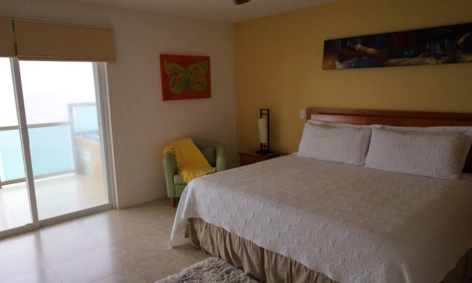 Colonos Cuzamil Condo | 4/4.5 Condo Oceanfront Cozumel Downtown AC WiFi Security