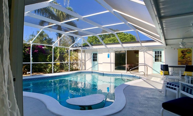 South Gate Ridge House | 4 BR/3BA Poolhouse is 4 miles from the famous Siesta Key Beach