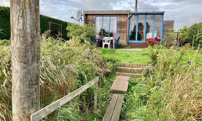 Anjum House | 4pers - House w Sauna, Winter garden & fishing pier in front of the Lauwersmeer