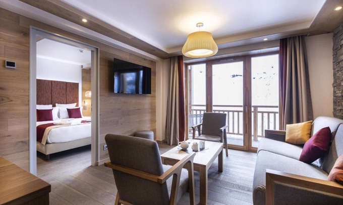 Lanslevillard Apartment | 50m from ski slopes, fitness, swimming pool, sauna, hammam, balcony, fireplace or stove, tv