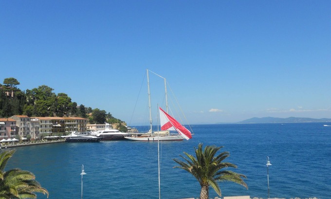 Monte Argentario Apartment | A balcony overlooking the blue sea of the Argentario, with unlimited Giga Tim