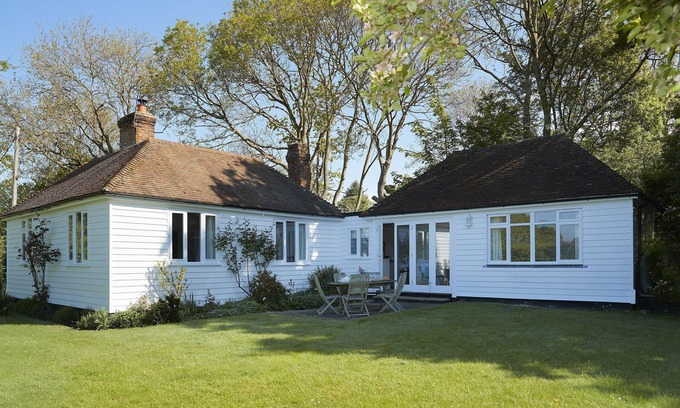 Wittersham Cottage | A charming, detached, weather-boarded cottage, set in a secluded location on the edge of the histori