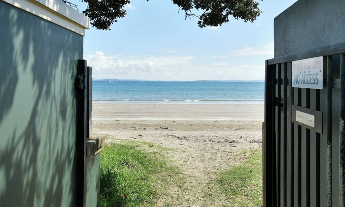 Manly House | A Kiwi beachside holiday a couple of minutes walk to the sand .