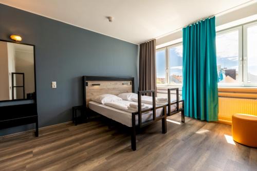 St. Ulrich Hotel | a&o München Laim