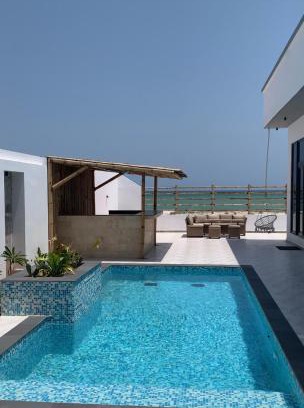 Al Ashkharah Ski Chalet | Acacia Beach Villa