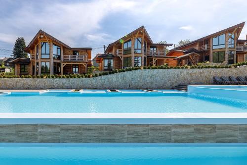 Plavya Ski Chalet | Adel Resort